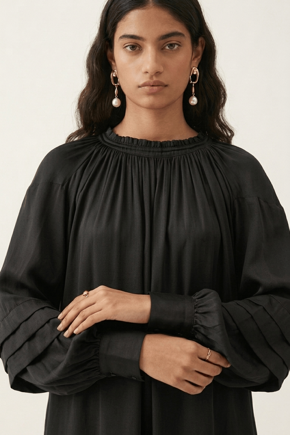 Black Alice dress by Doodlage, showcasing a stylish, fitted design with elegant details and a comfortable fabric fit.