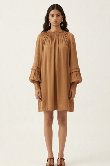 Doodlage Alice sand dress with flowy fabric and short sleeves, displayed on a hanger against a neutral background.