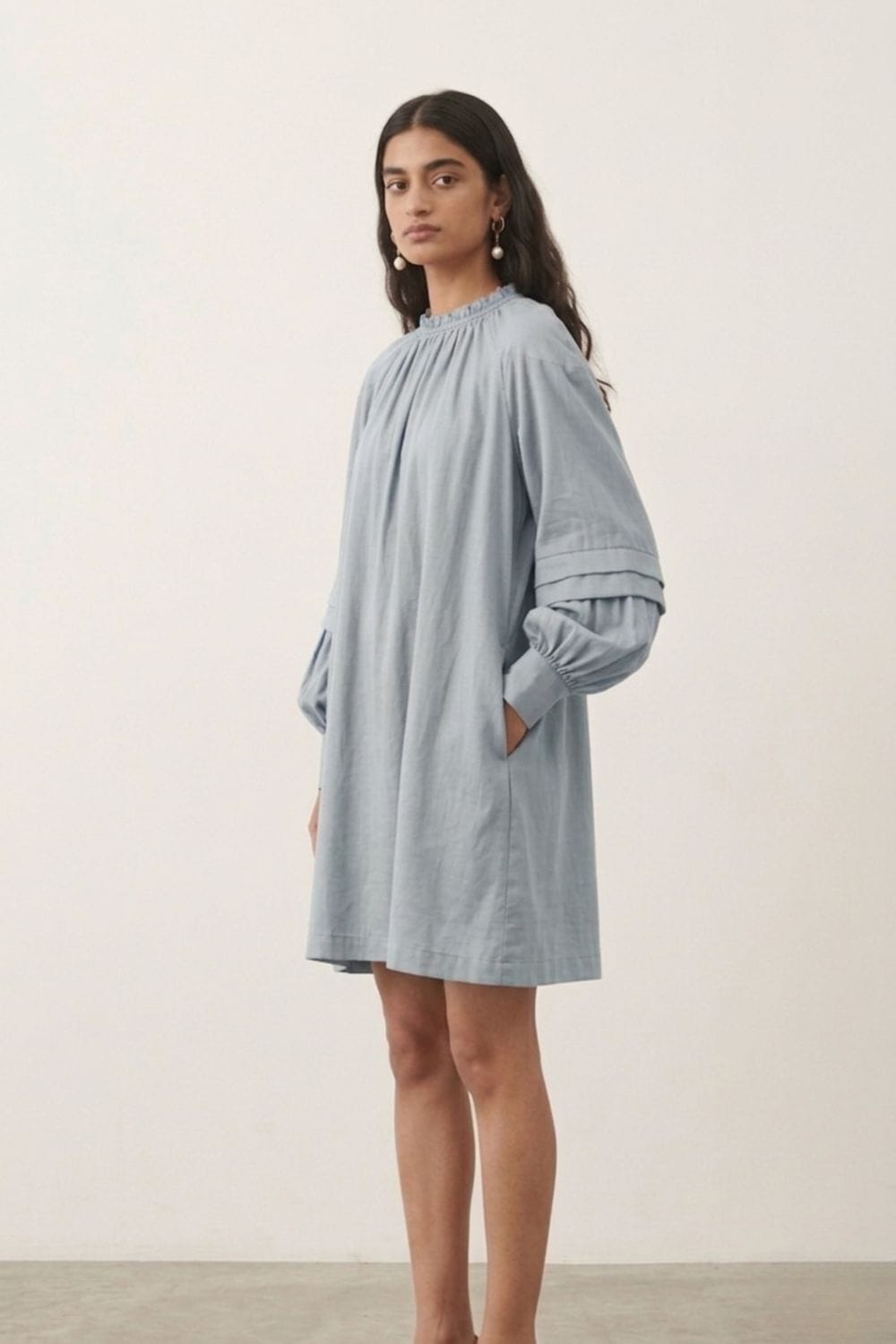 Blue Alice dress by Doodlage, featuring a stylish and comfortable design with a fitted bodice and flowy skirt.