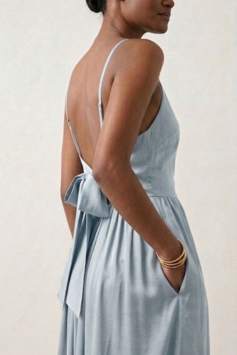 Mary blue dress by Doodlage, lightweight casual dress with a relaxed fit and elegant design, shown on a hanger.