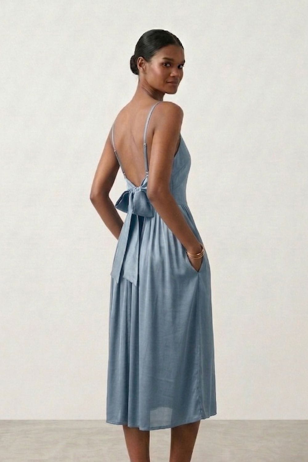 Mary blue dress by Doodlage, stylish and comfortable, shown on a model with a flowing design and vibrant blue color.