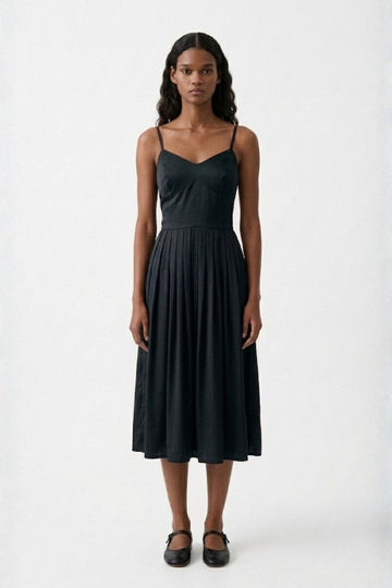 Black Doodlage Mary dress with long sleeves and a fitted silhouette, shown on a hanger against a plain background.