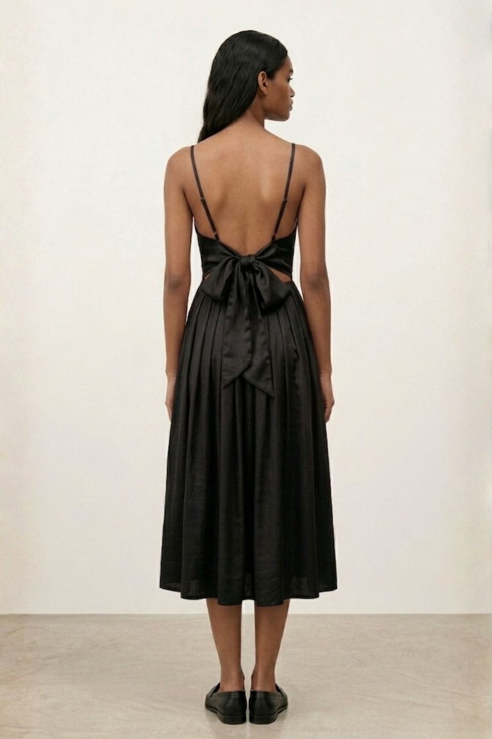 Black Mary dress by Doodlage featuring a stylish, fitted design with subtle detailing and a classic silhouette.