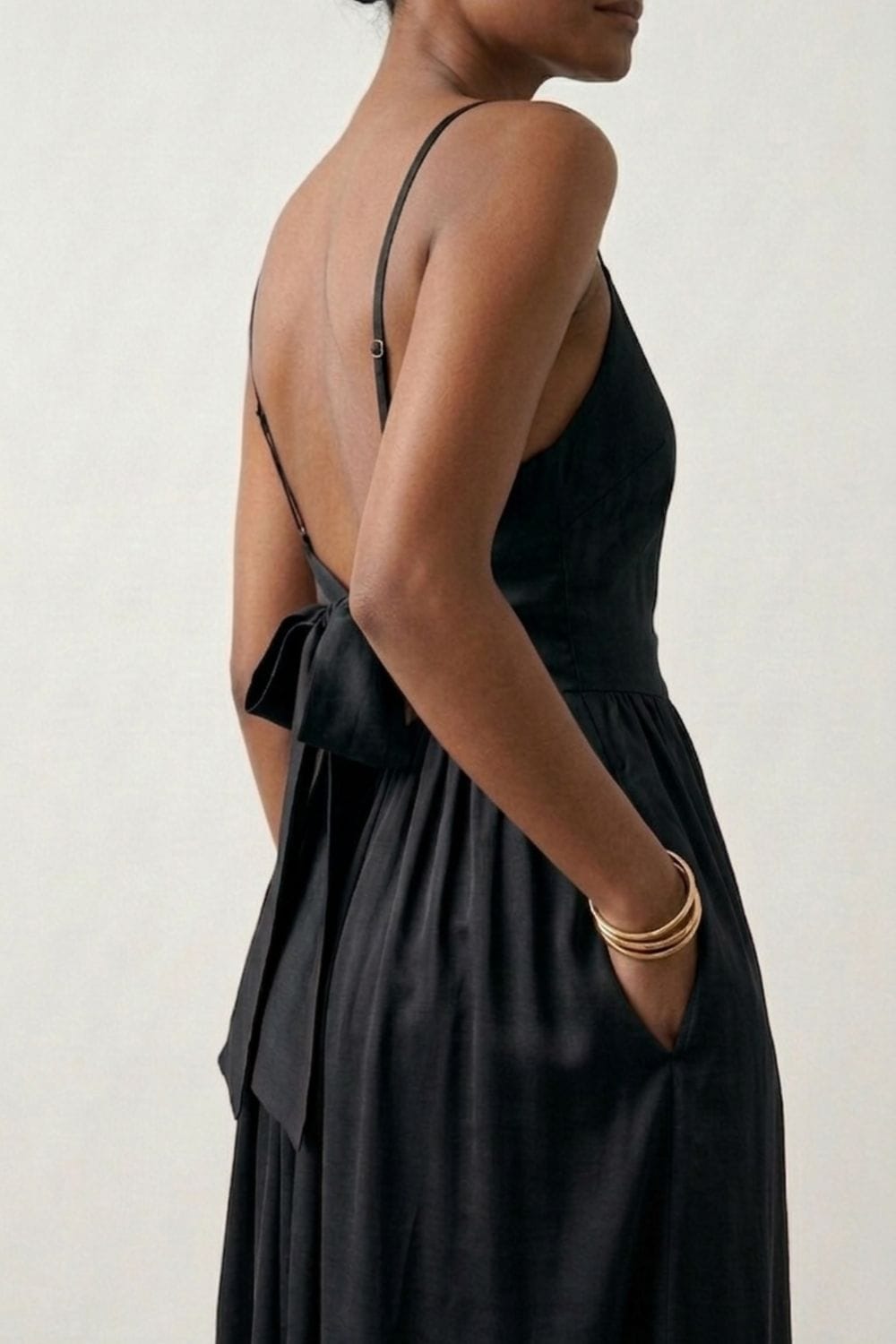 Black Doodlage Mary dress with long sleeves and fitted design, displayed on a mannequin.