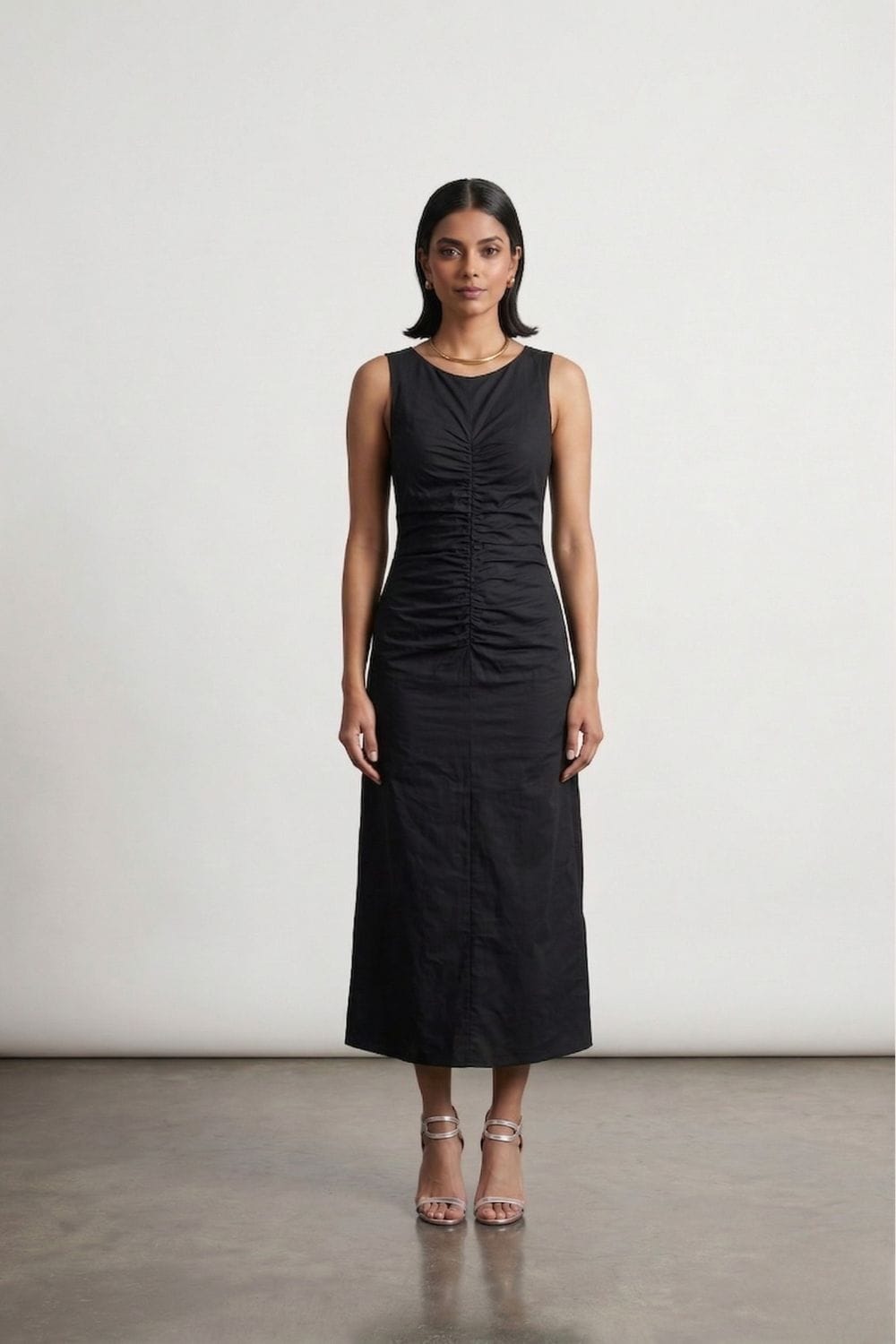 Sarah black dress by Doodlage, stylish dress with a fitted silhouette and elegant design, shown on a model.