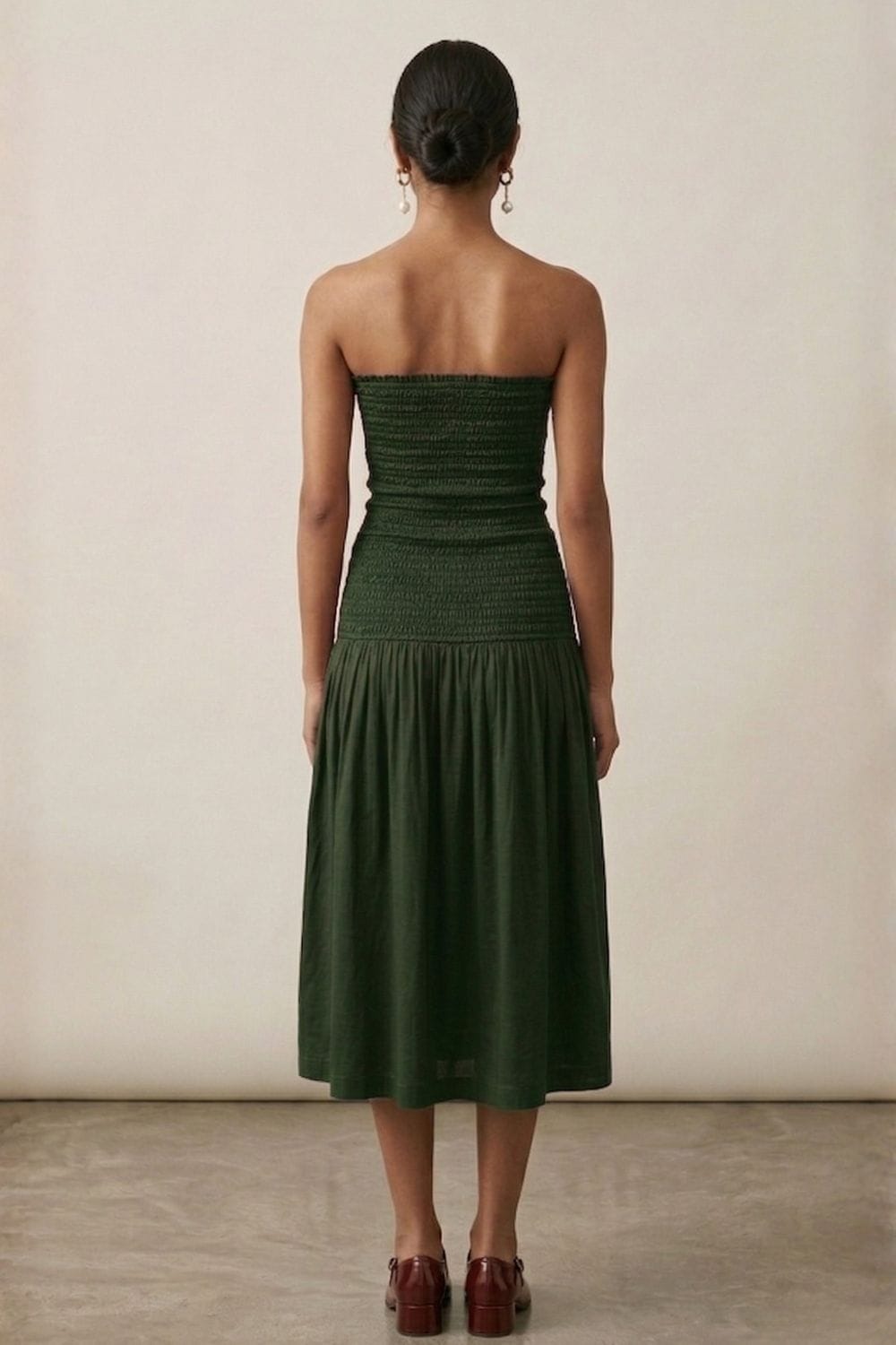 Green cherry print dress by Doodlage, showcasing the full length, lightweight fabric, and stylish design on a model.
