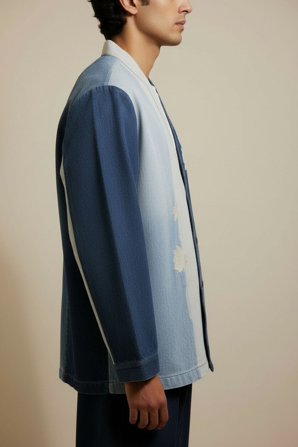 Doodlage Ivy denim panelled jacket displayed on a hanger, featuring patchwork denim design and classic collar.