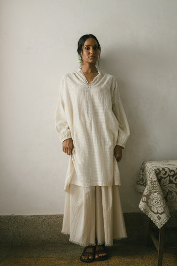 Deeta Iffat co-ord set with matching top and pants in soft fabric, stylish and comfortable for casual wear.