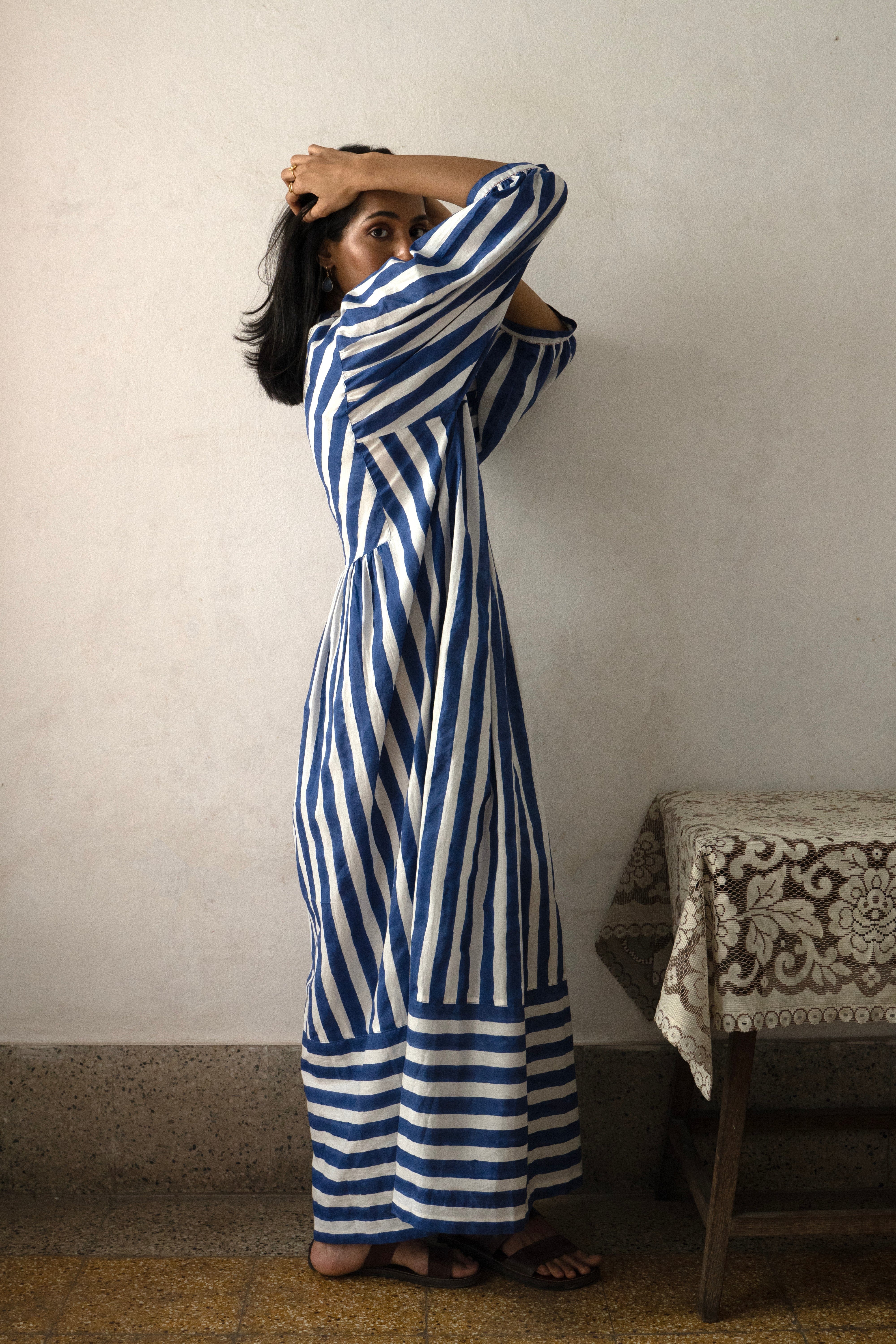 Deeta Nidar tea dress featuring a flowy, floral design with short sleeves and a relaxed fit, perfect for casual wear.