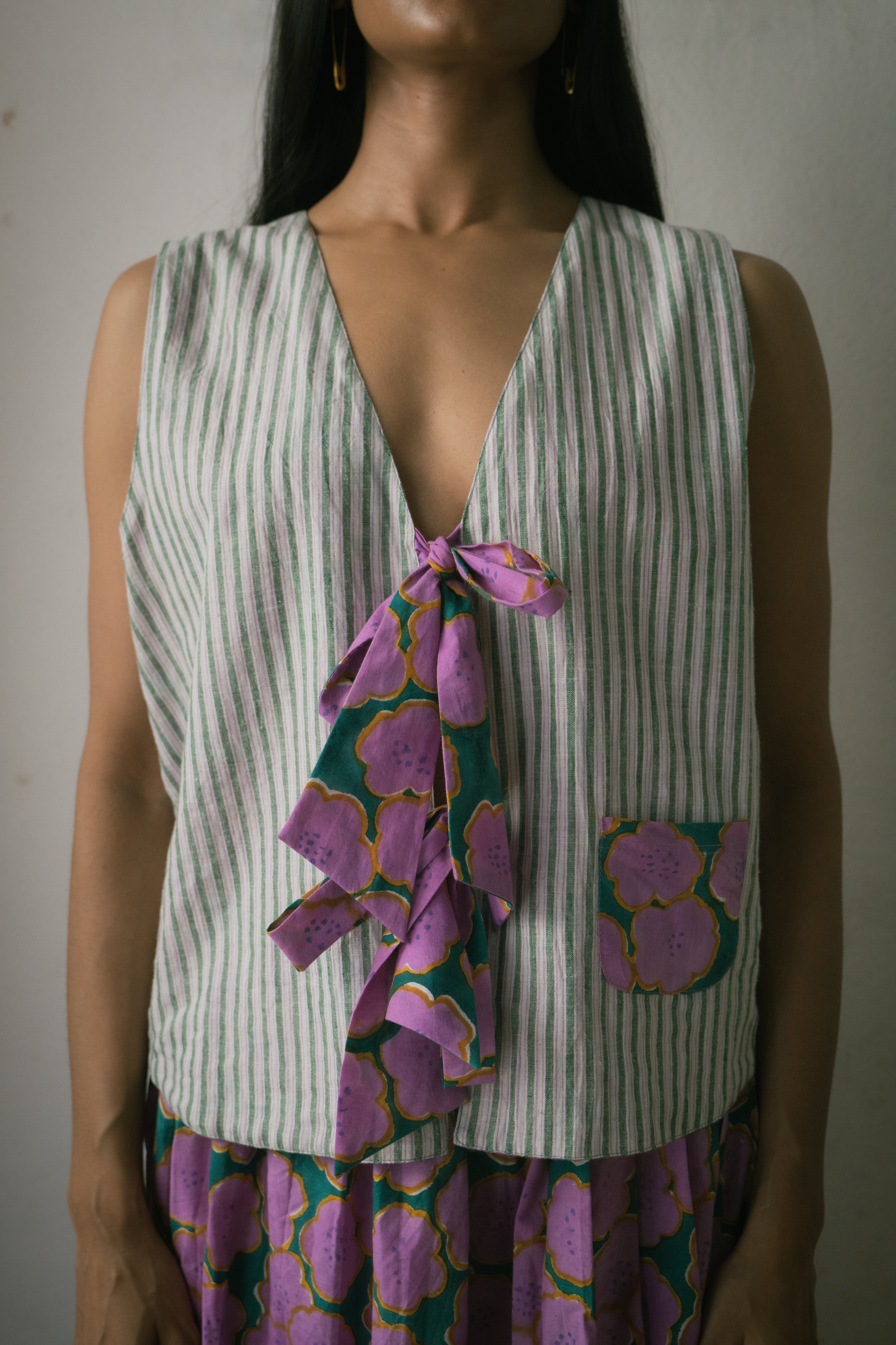 Deeta Clover skirt set featuring a stylish plaid skirt and matching top, perfect for casual or semi-formal wear.