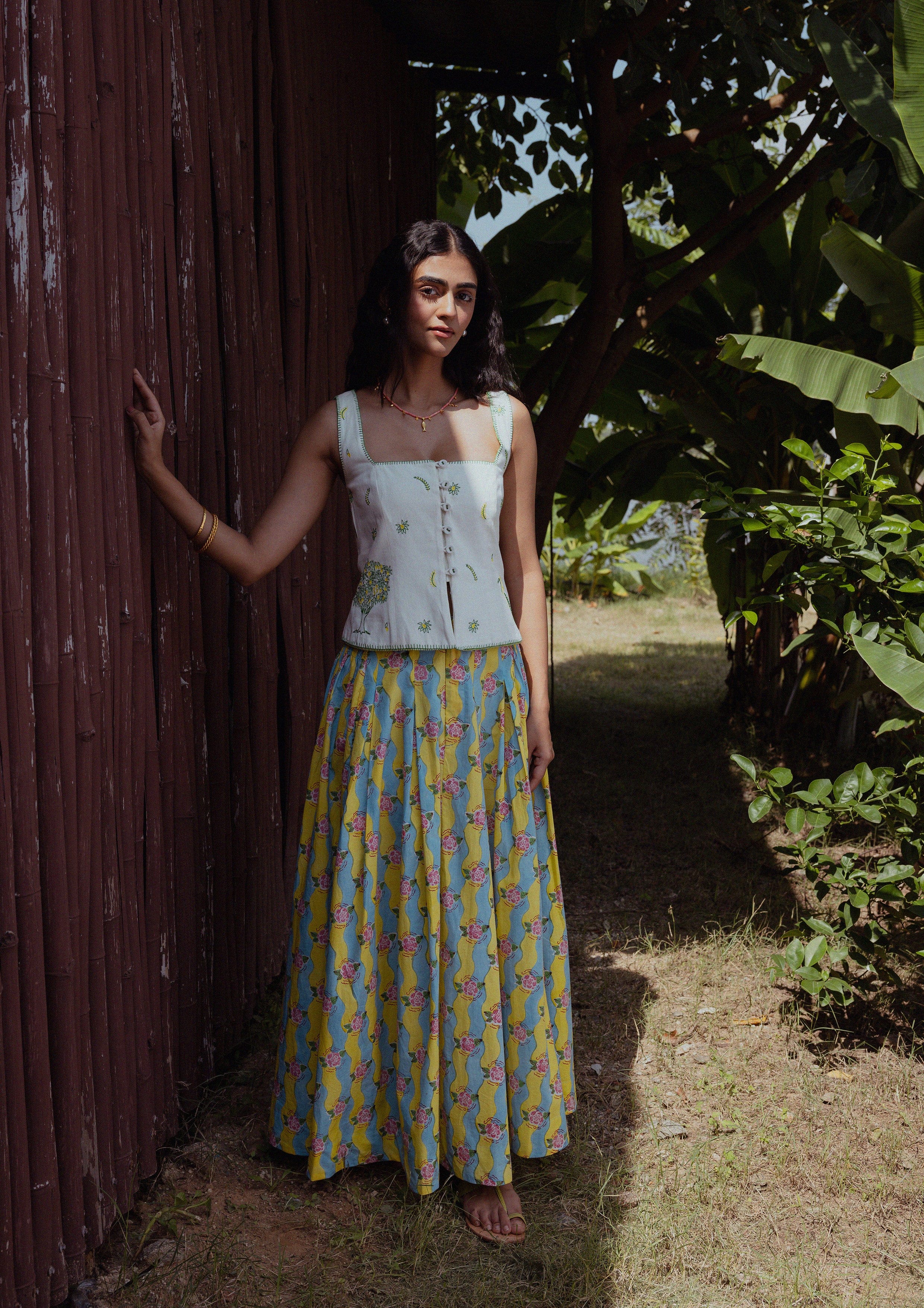 The Raw India Etah Skirt Ganga Lime, vibrant green bottoms with traditional Indian design, displayed on a white background.
