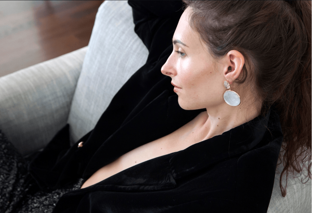 Gold Fina earrings by Bombaybirds featuring elegant hoop design with intricate detailing on a white background.
