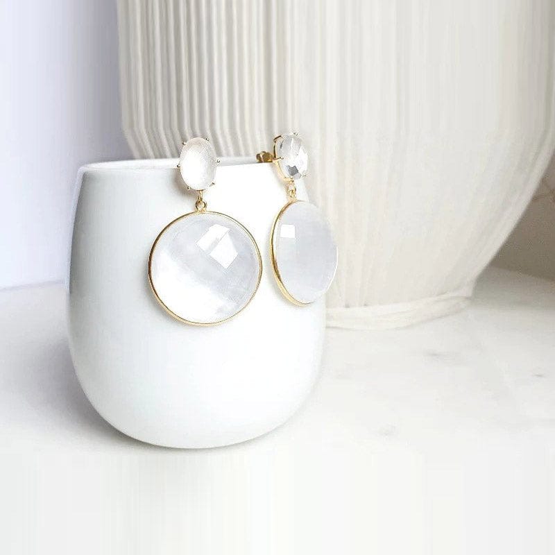 Bombaybirds Fina earrings, elegant gold-tone jewelry with intricate design, displayed on a white background.