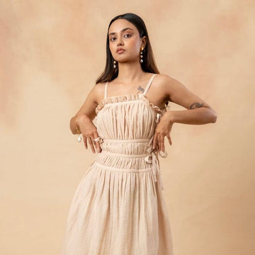 Doodlage Kiteberry dress displayed full-length, featuring a stylish, eco-friendly design with a fitted bodice and flowing skirt.