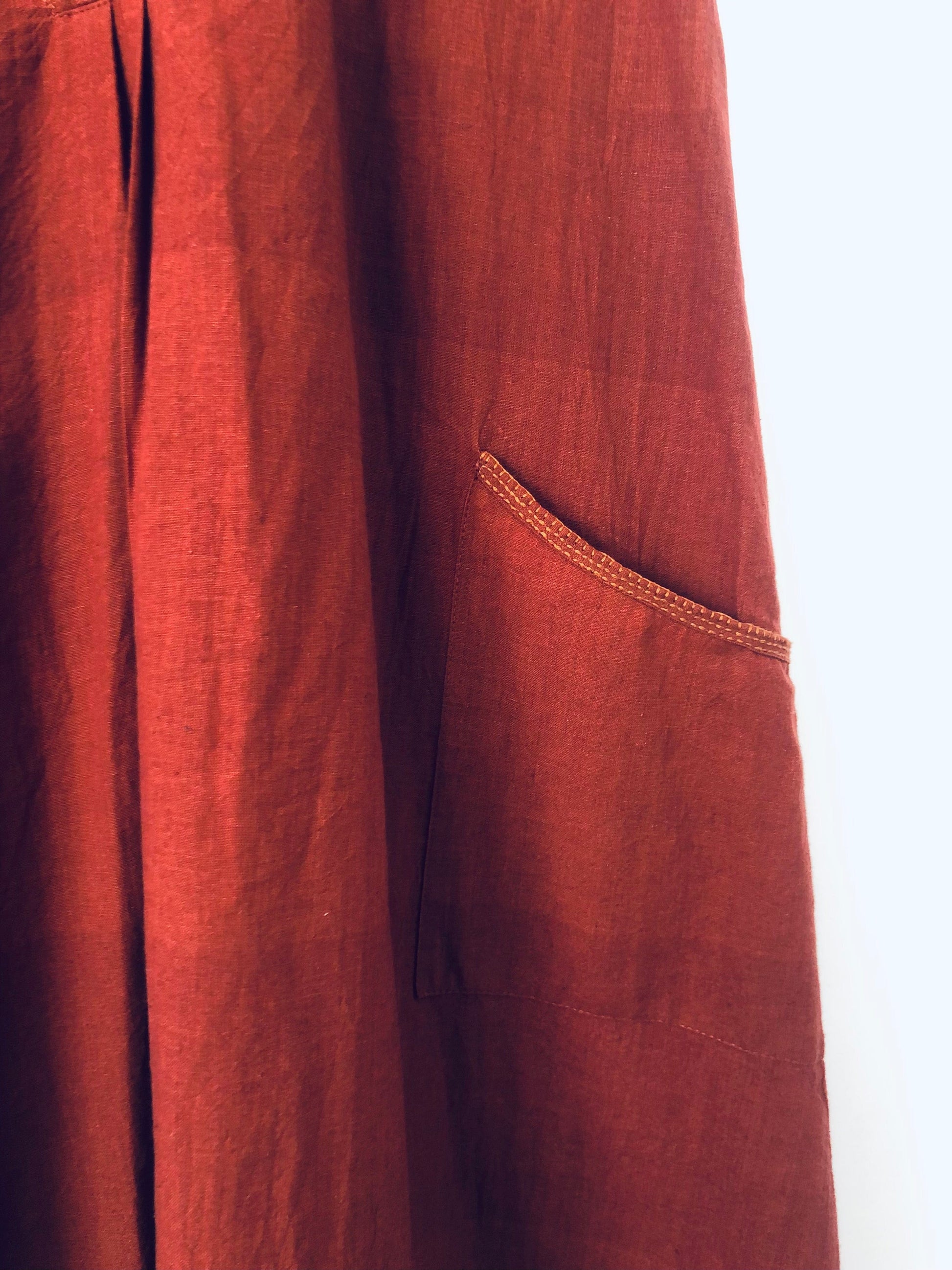 Deeta Bay dress featuring a stylish, flowing design with a fitted waist and elegant neckline, perfect for casual or formal wear.