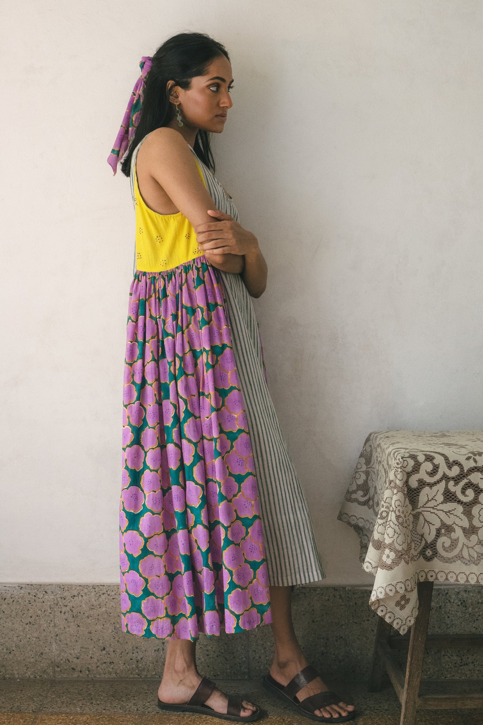 Deeta blooming patchwork dress with colorful floral and geometric patterns, short sleeves, and lightweight fabric.