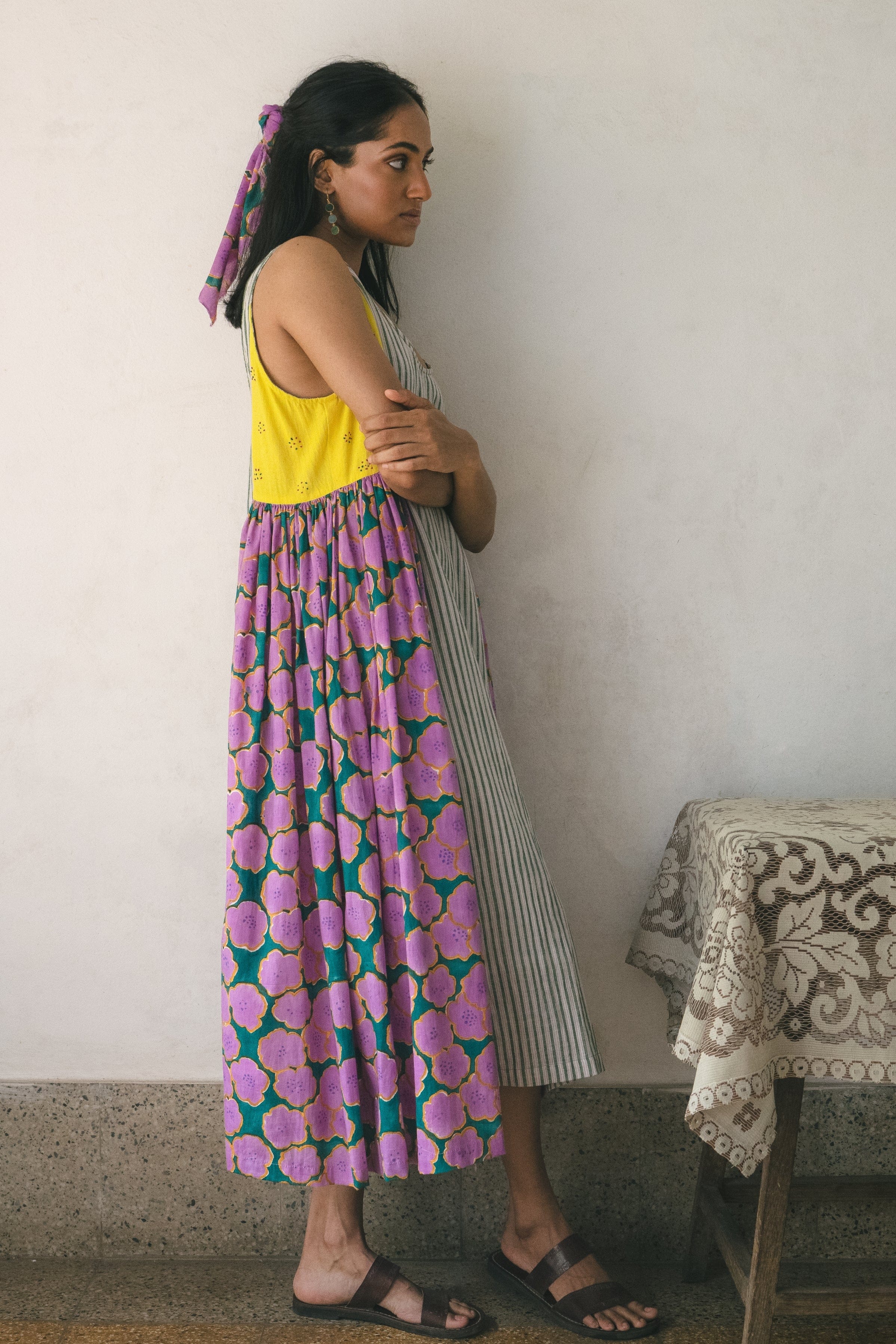 Deeta blooming patchwork dress with colorful floral and geometric patterns, short sleeves, and lightweight fabric.