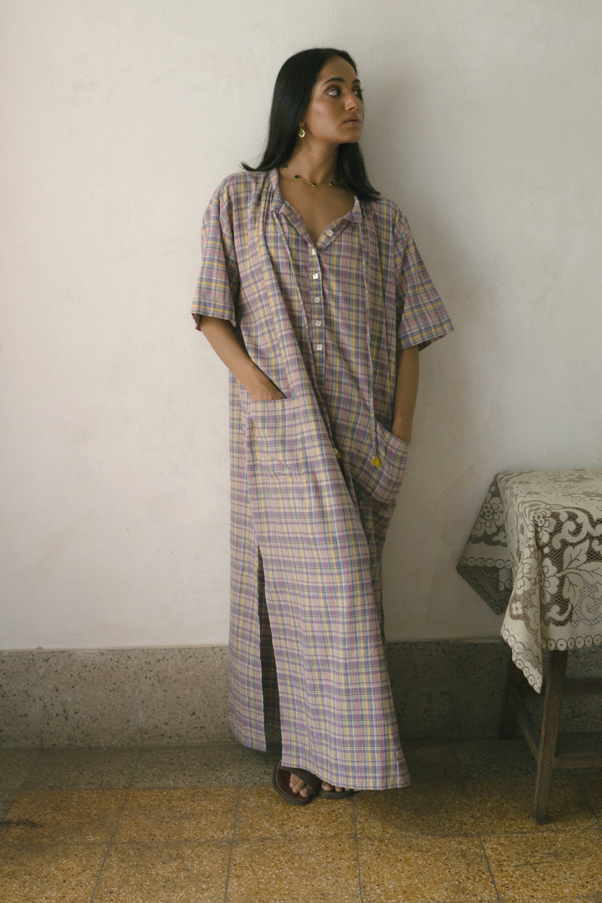Deeta Meadow long tunic dress featuring a flowy silhouette, floral print, and lightweight fabric on model.