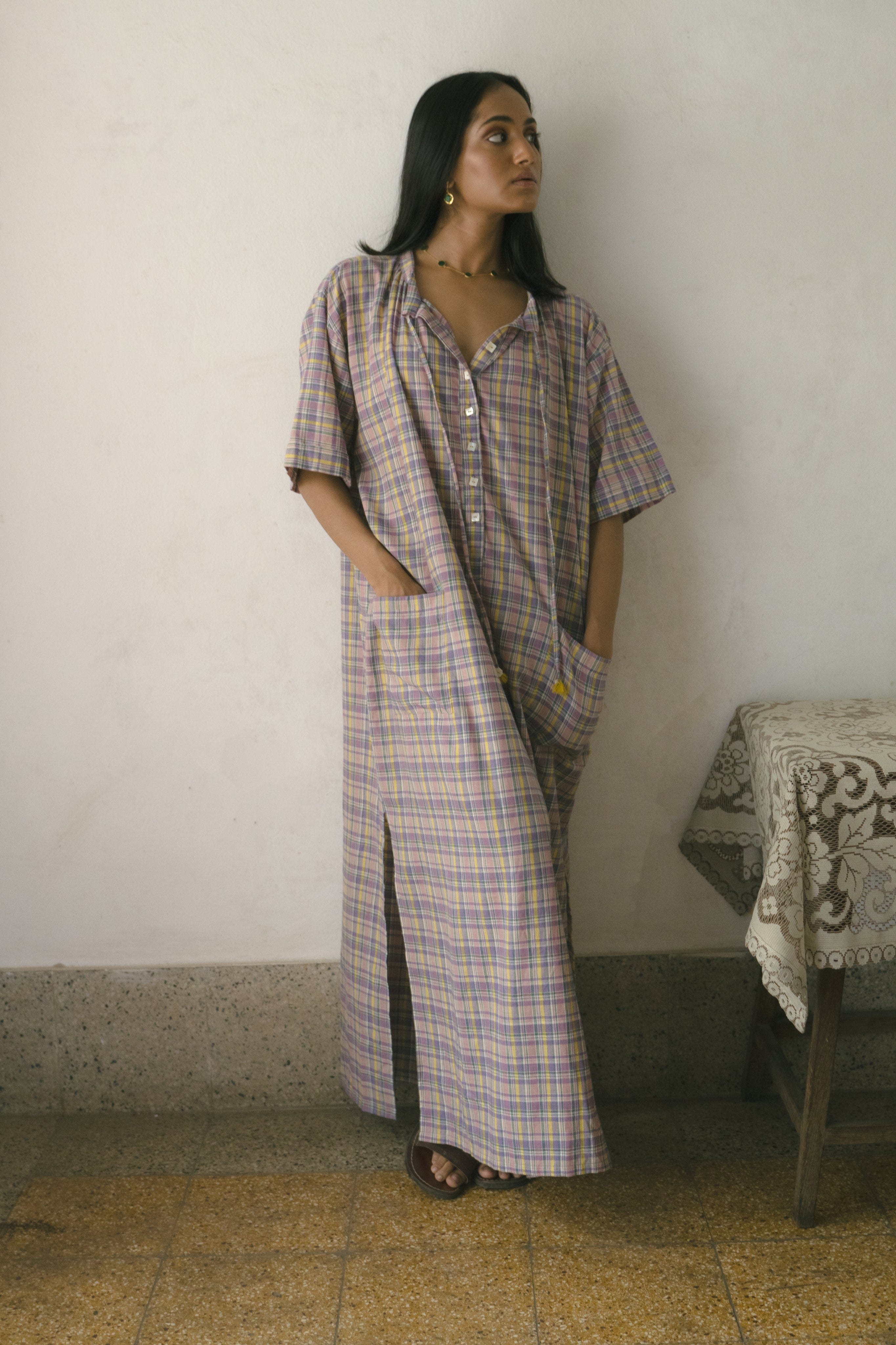 Deeta Meadow long tunic dress featuring a flowy silhouette, floral print, and lightweight fabric on model.