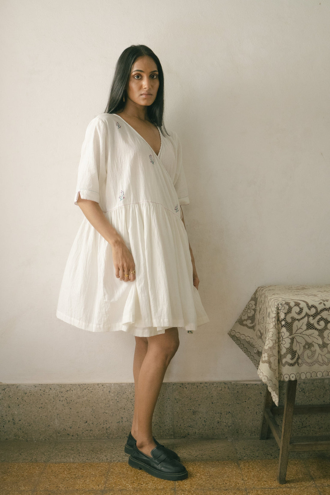 Deeta Sara tunic dress with long sleeves and relaxed fit, shown in a stylish, casual design on a neutral background.