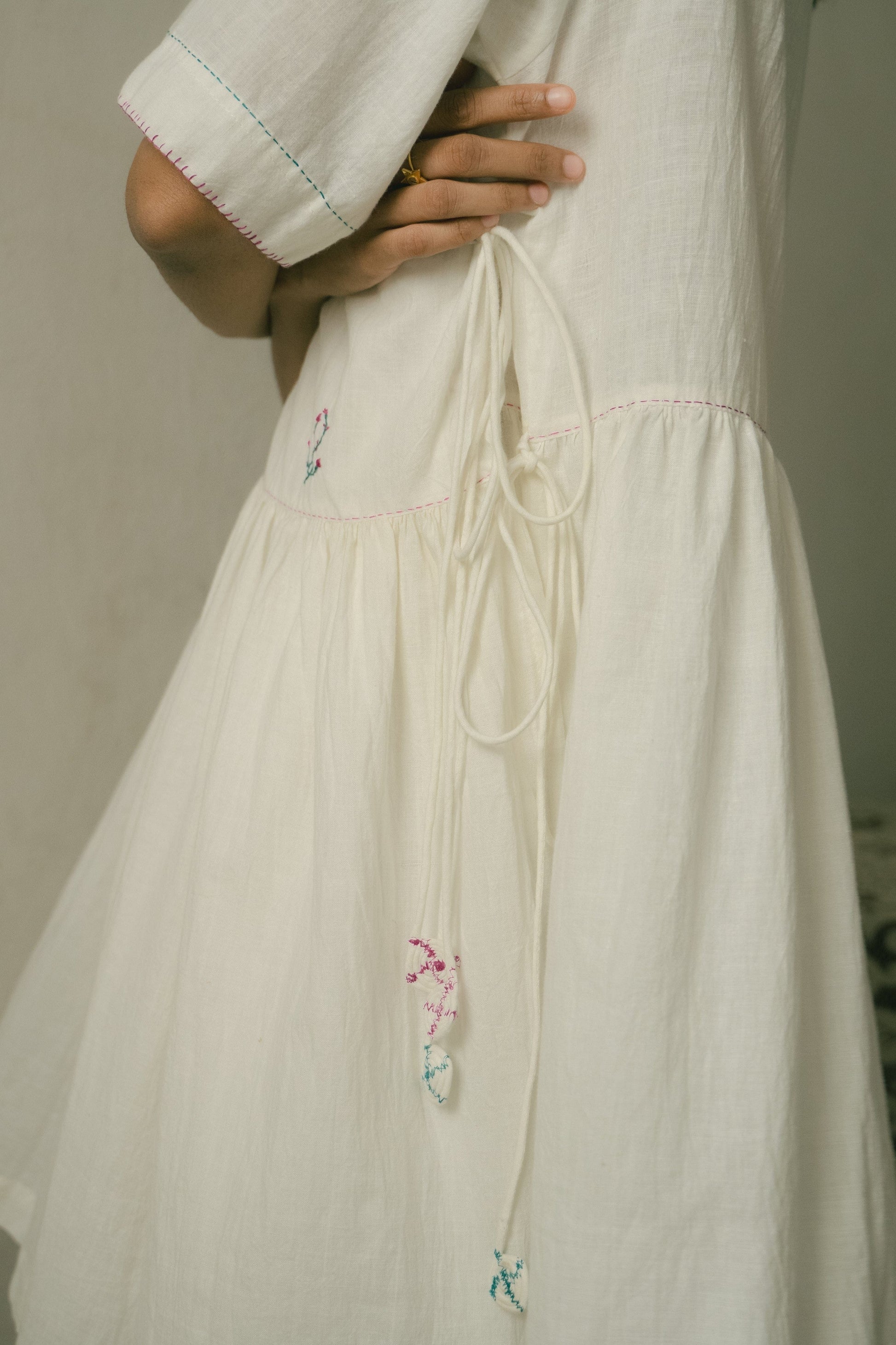 Deeta Sara tunic dress featuring a relaxed fit, long sleeves, and a stylish, comfortable design ideal for casual wear.