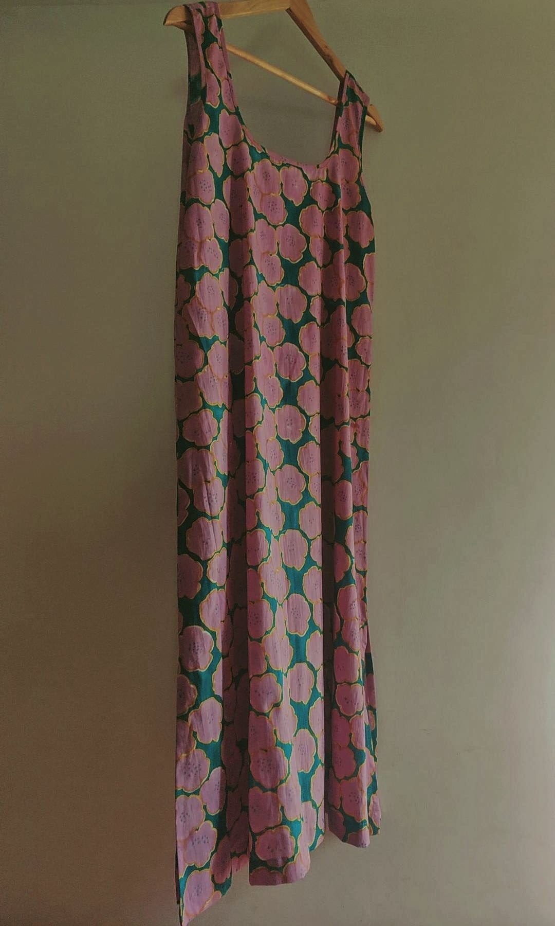 Deeta Clover slip dress in soft fabric, featuring a sleeveless design, V-neckline, and a flowy silhouette.