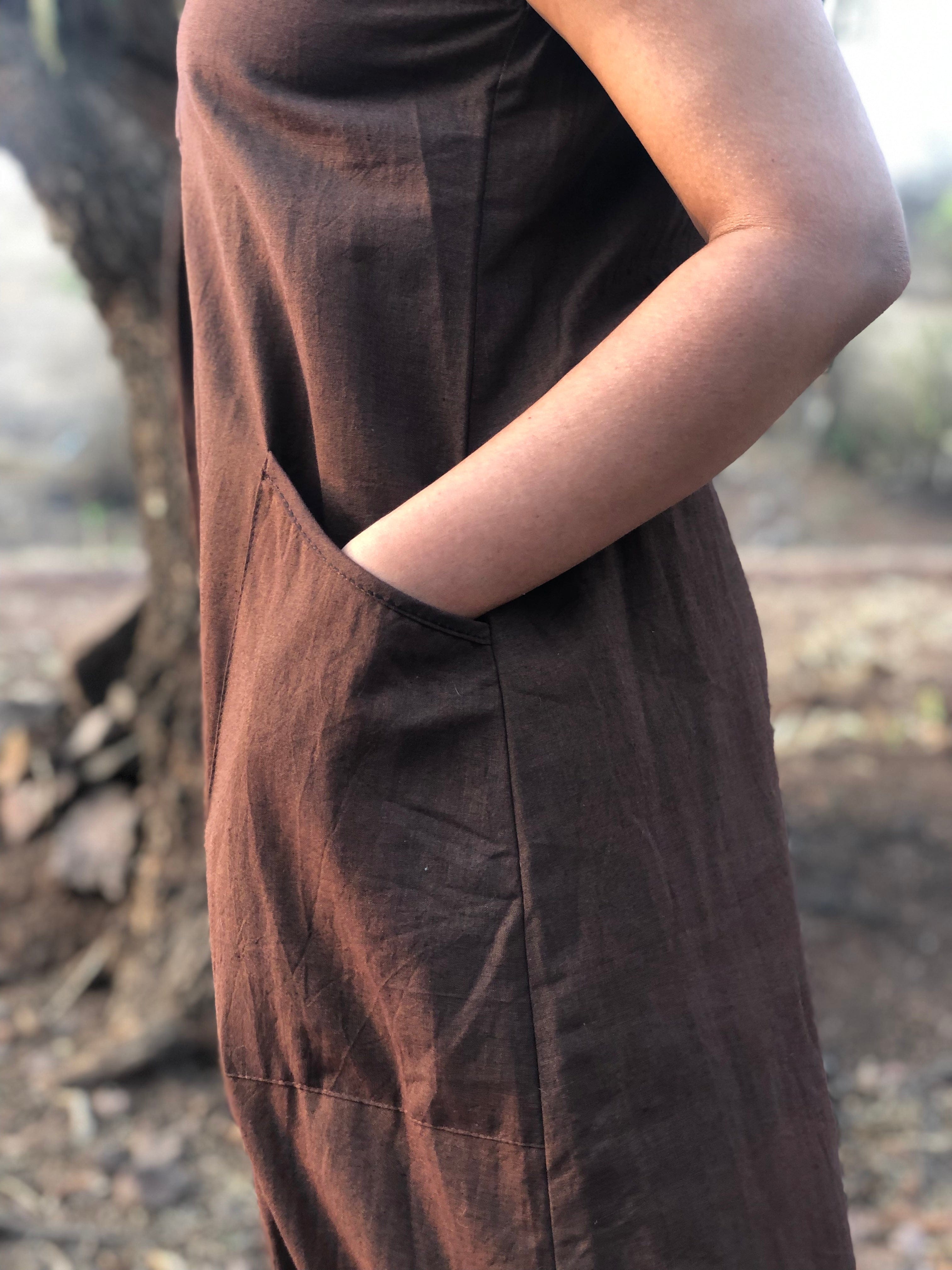 Deeta Coco dress featuring a stylish, flowing design with floral patterns and a comfortable fit.