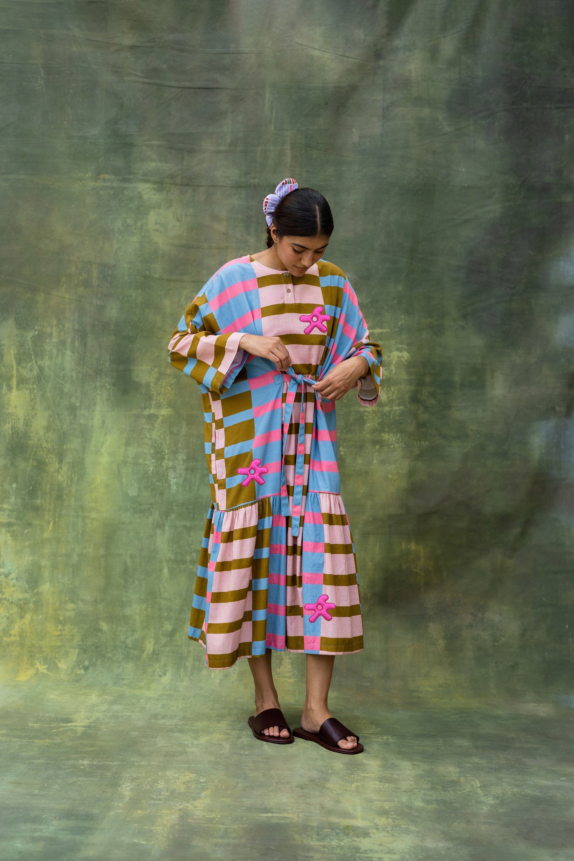 Doodlage Edith striped dress with short sleeves and a relaxed fit, featuring colorful horizontal stripes on lightweight fabric.