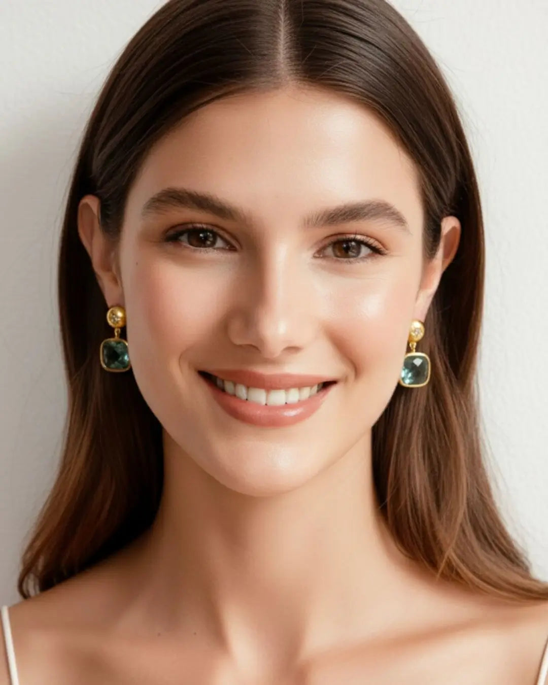 Bombaybirds Izare earrings featuring elegant teardrop design with gold-tone finish, showcasing stylish jewelry for women.