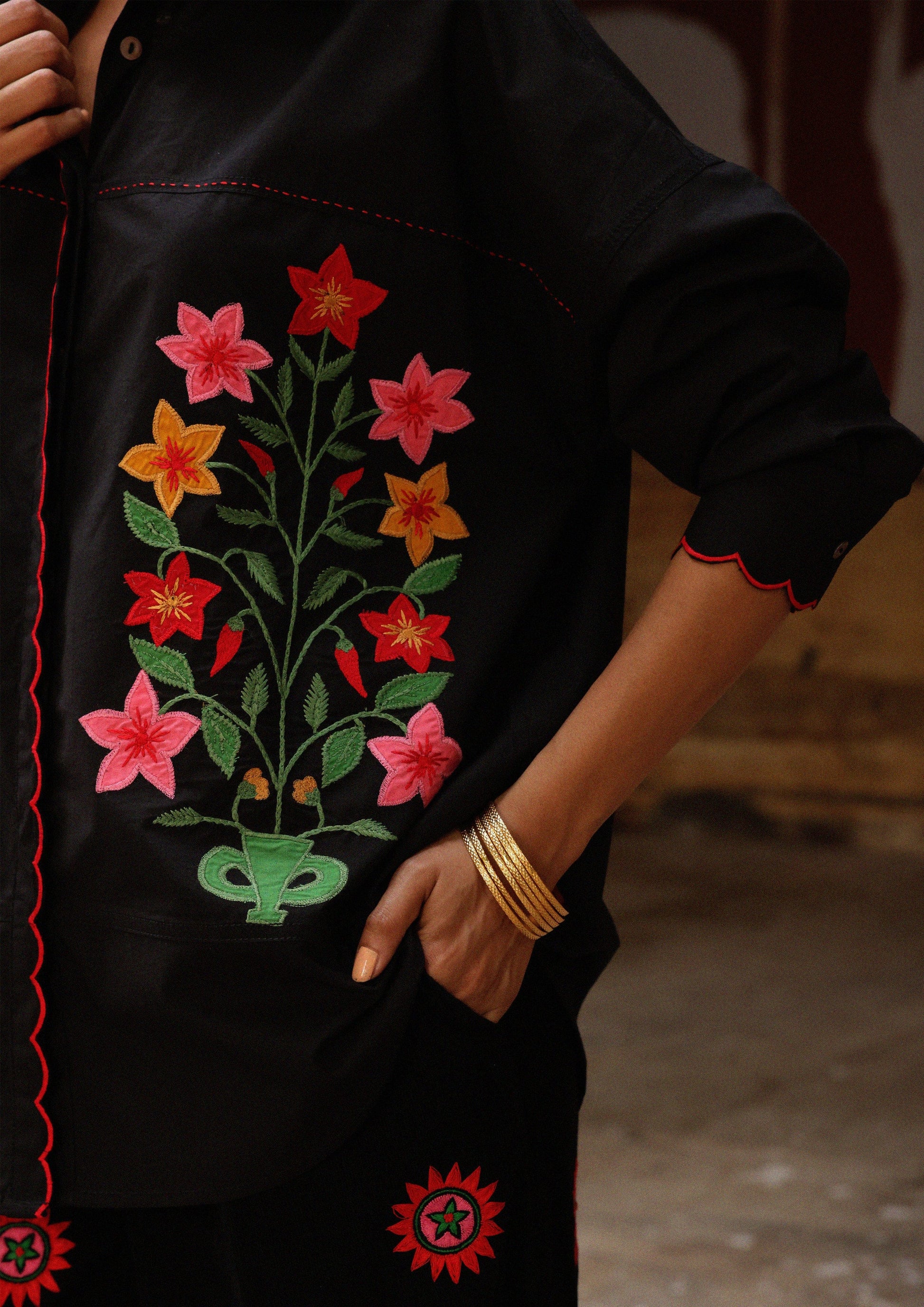 The Raw India Jaigarh shirt featuring aster buta patchwork embroidery with vibrant, intricate design on soft fabric.