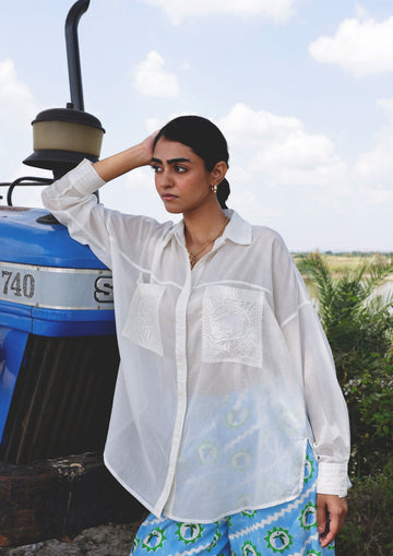 White Jaigarh shirt with intricate Chikankari embroidery, featuring traditional handcrafted Indian craftsmanship.