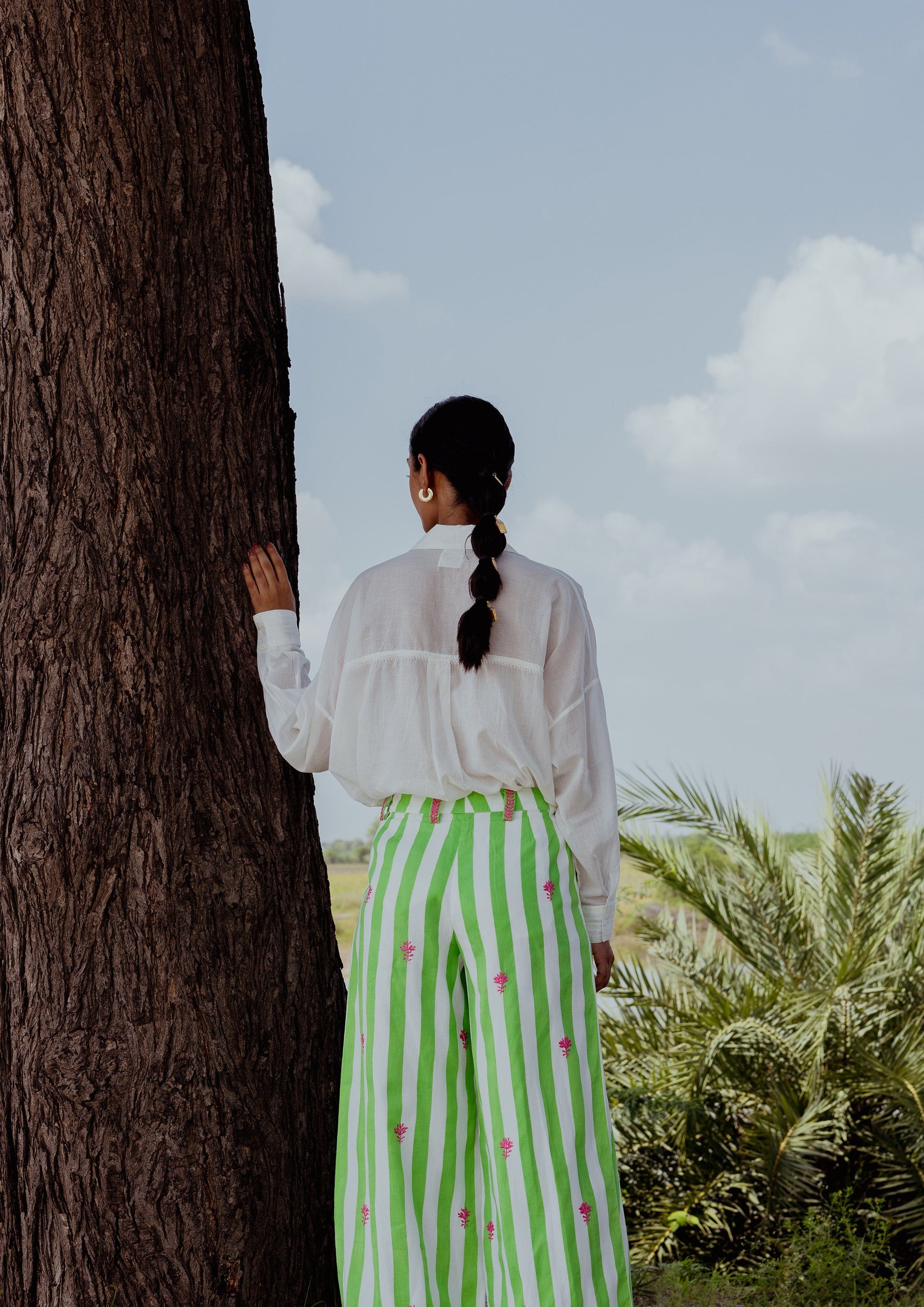 White Jaigarh shirt by The Raw India featuring intricate Chikankari embroidery, stylish top for elegant ethnic wear.