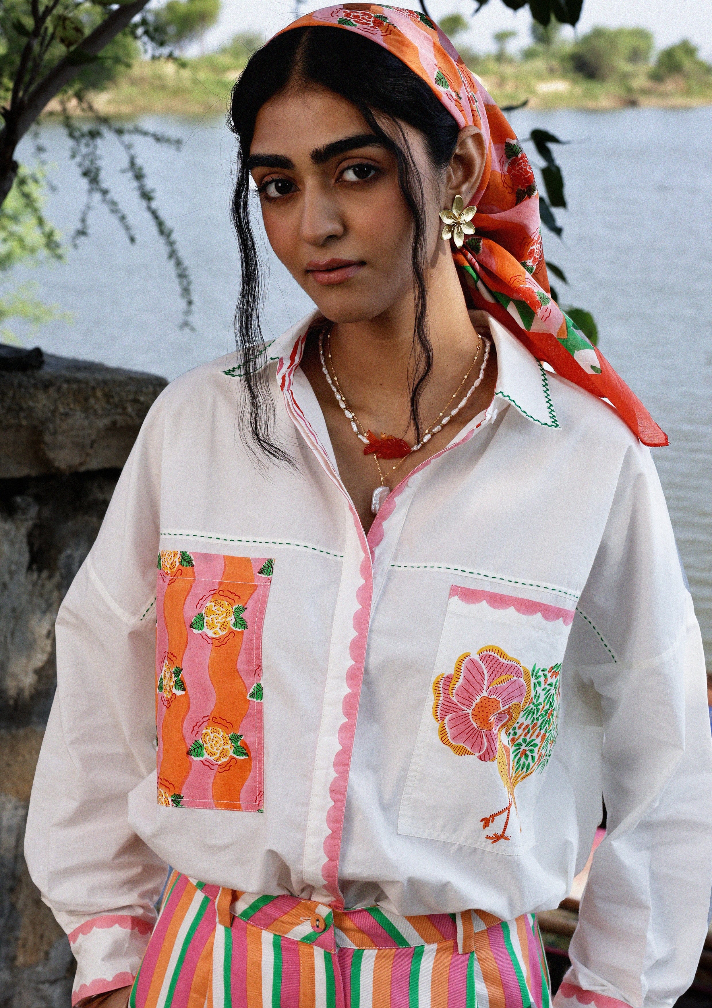 The Raw India Jaigarh Shirt in River Crane, a stylish casual top featuring a relaxed fit and intricate design details.