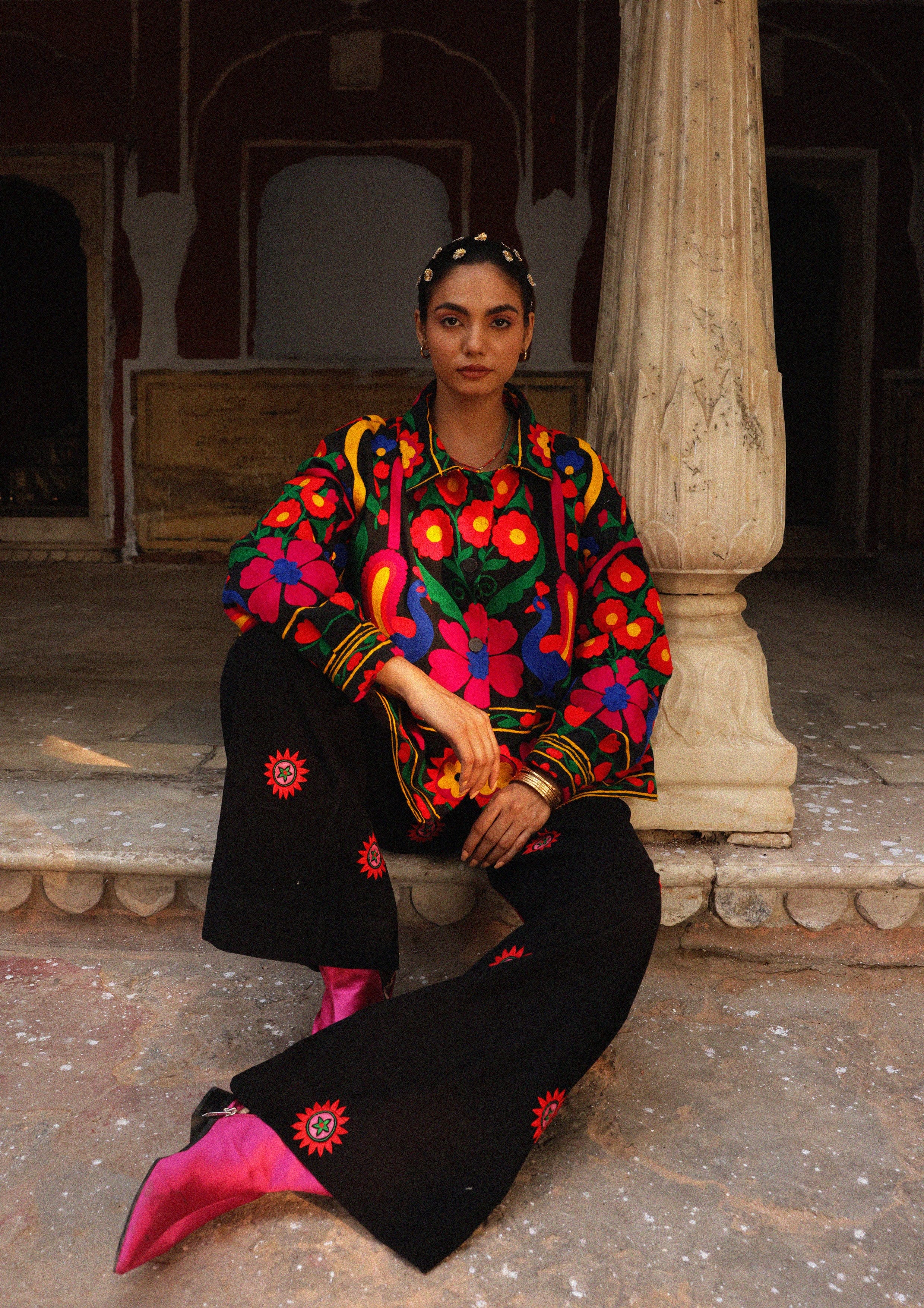 Pink Jaipur jacket by The Raw India featuring intricate peacock embroidery and traditional Indian design details.