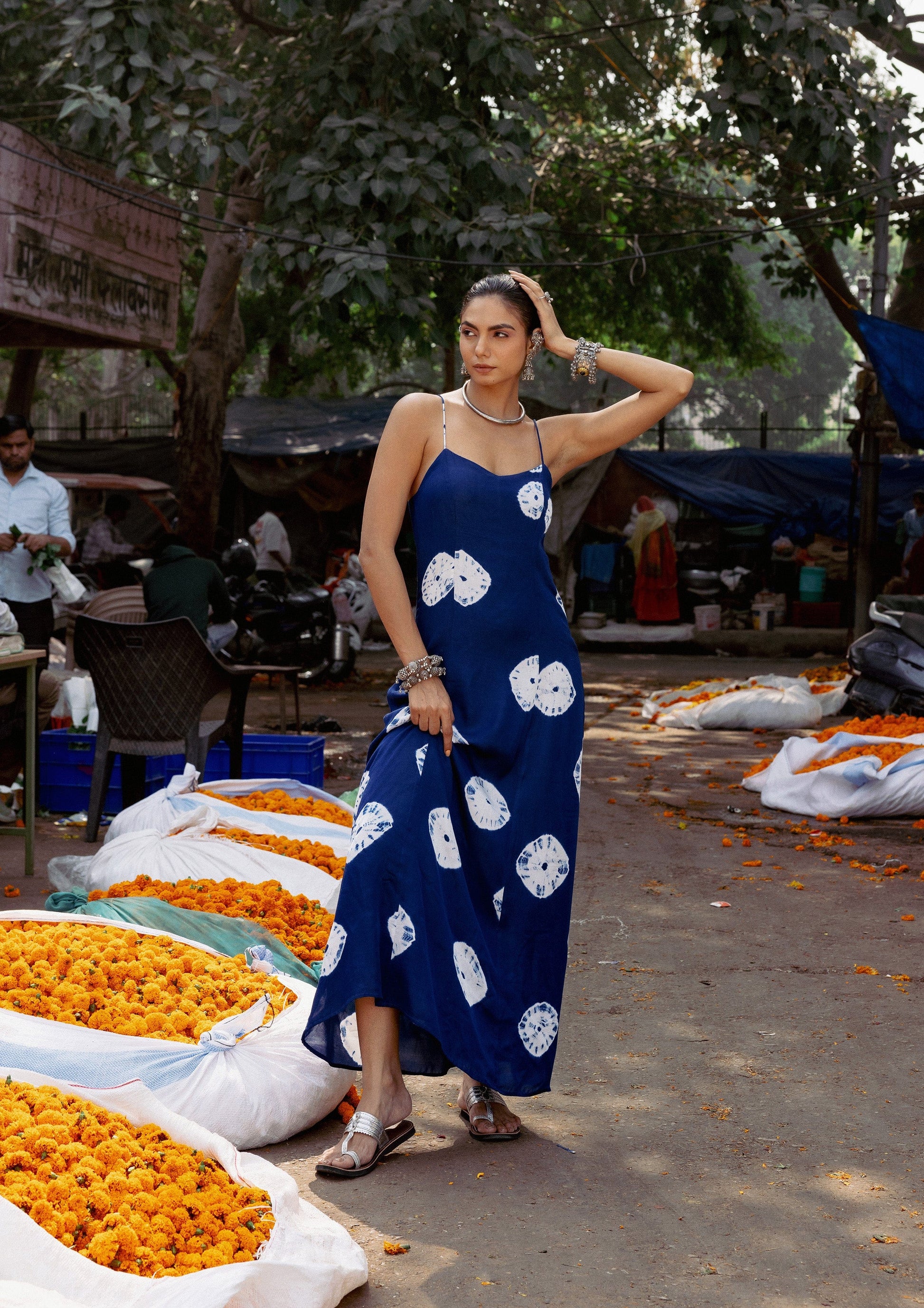Indigo bandhani Jodha dress by The Raw India, featuring traditional tie-dye patterns and a flowing fabric design.