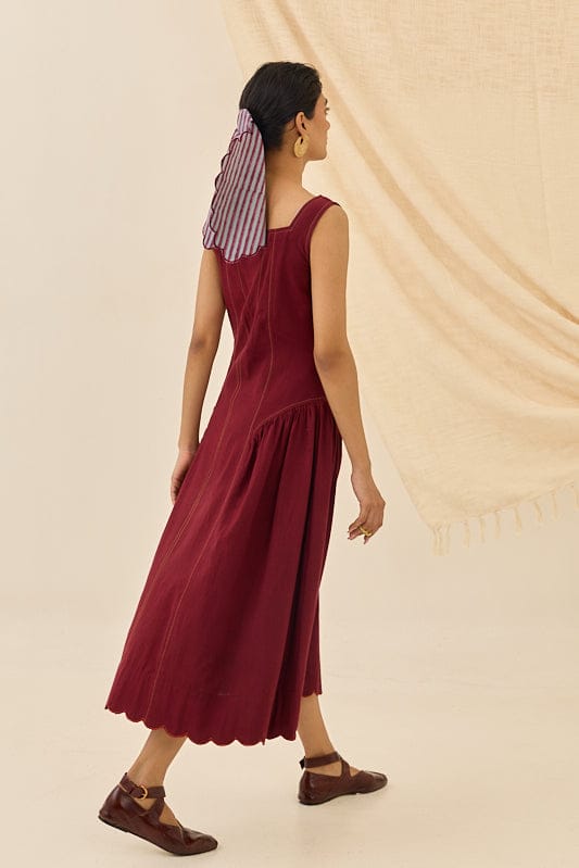 JODI Kuhu handloom dress with intricate woven patterns and traditional design, displayed on a hanger.