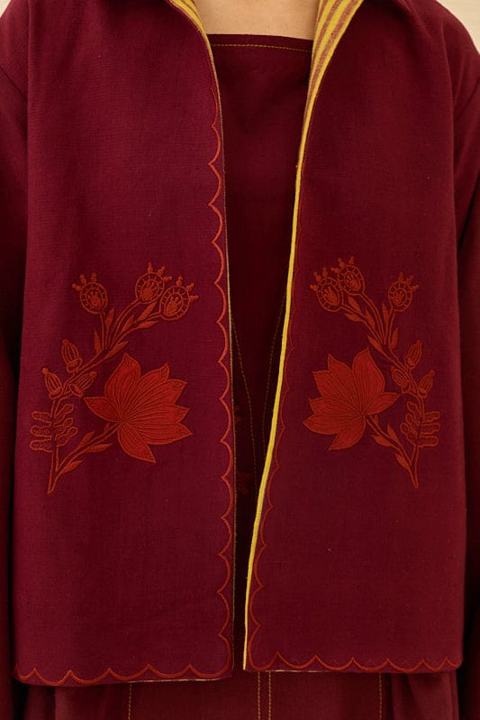 Reversible Kuhu handloom jacket by JODI featuring vibrant woven fabric and stylish design, shown with both sides visible.