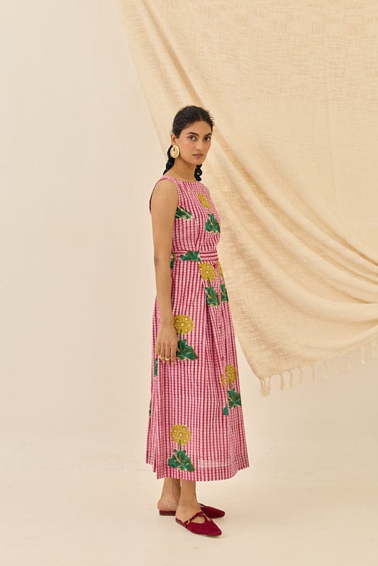 JODI Lali dress in vibrant floral fabric, sleeveless design with a fitted waist and flowing skirt, perfect for summer occasions.