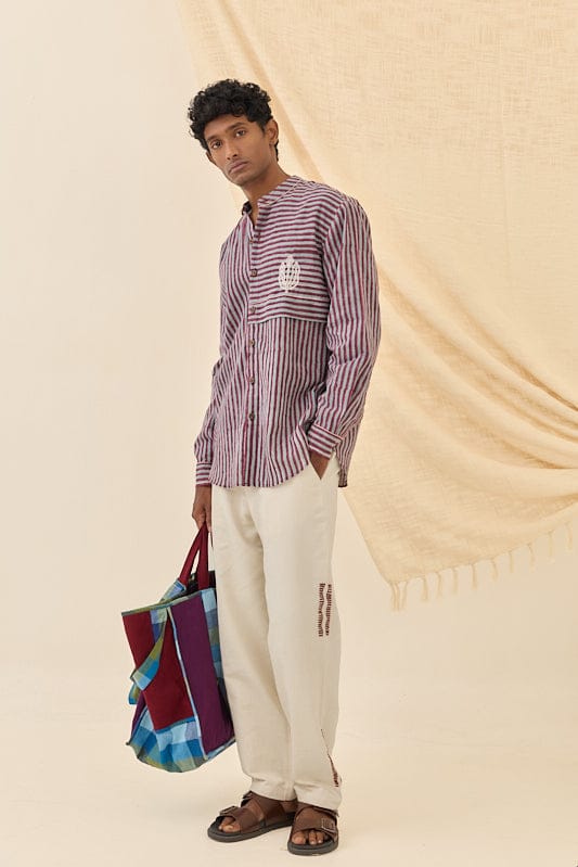 JODI relaxed fit shirt for women, soft fabric, casual style, in a light color, displayed on a hanger.
