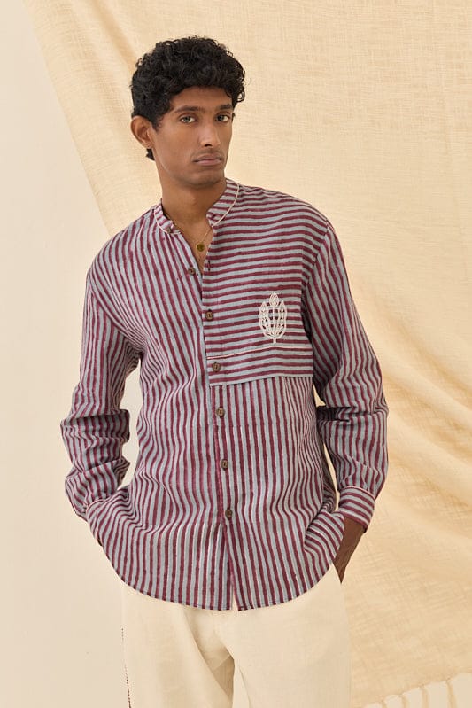 JODI relaxed fit shirt for women, soft fabric, casual style, in a light color, displayed on a hanger.