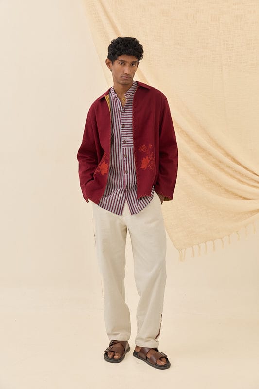 Reversible Kuhu handloom jacket by JODI, showcasing intricate traditional fabric and stylish design on both sides.