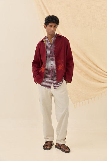 Reversible Kuhu handloom jacket by JODI, showcasing intricate traditional fabric and stylish design on both sides.
