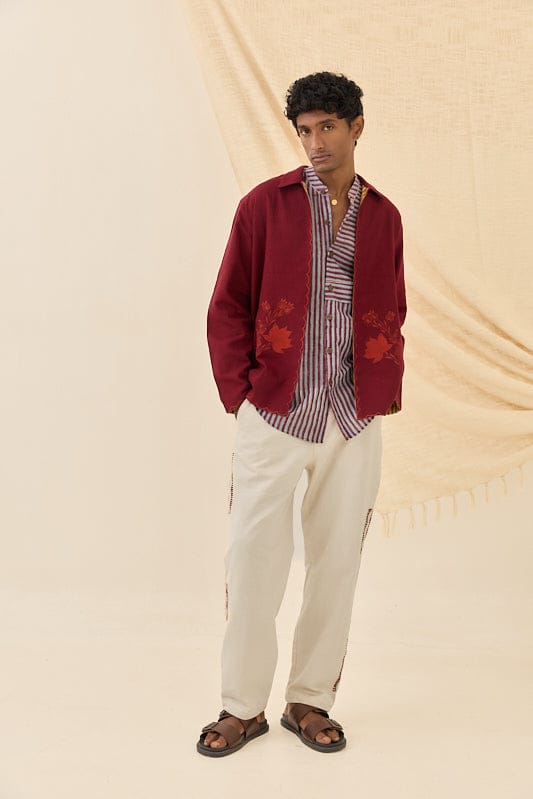 Reversible Kuhu handloom jacket by JODI, showing intricate woven patterns and vibrant colors on both sides.