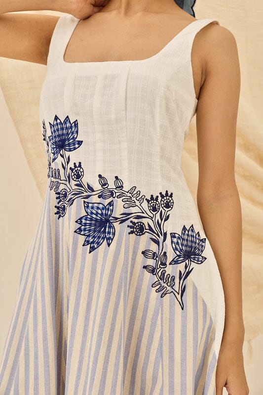 Kunj handloom dress by JODI featuring traditional fabric and intricate patterns, displayed hanging against a neutral background.