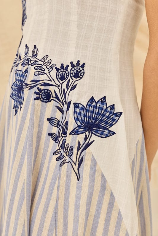 Kunj handloom dress by JODI featuring traditional woven fabric, long sleeves, and a vibrant, intricate pattern.