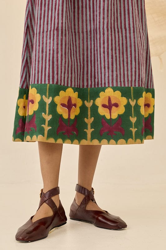 JODI Koyal dress featuring a stylish, flowing design with intricate details, perfect for elegant occasions.