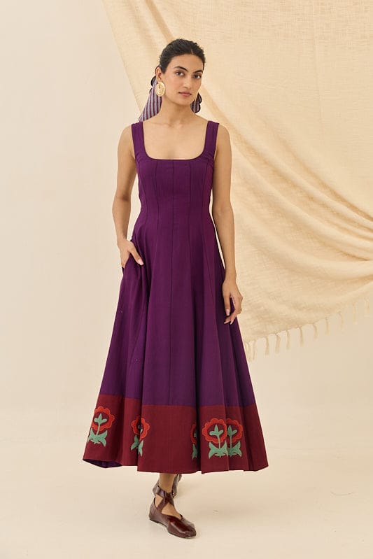 Morni handloom dress by JODI, featuring traditional woven fabric and vibrant colors, displayed on a hanger.