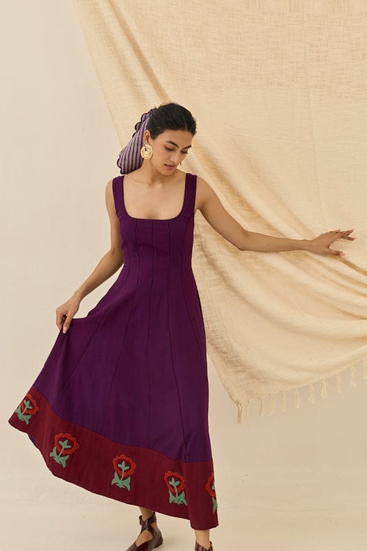 Morni handloom dress by JODI featuring traditional woven fabric and vibrant colors, displayed on a hanger.