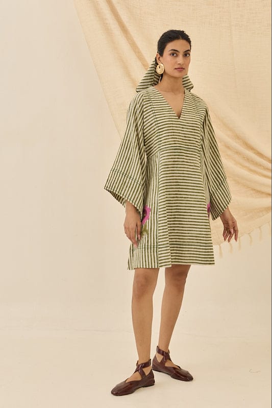 JODI Pihu handloom shift dress in vibrant fabric with short sleeves and a relaxed fit, displayed on a hanger.