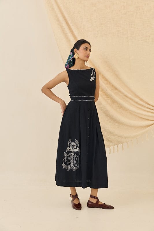 JODI Jugnu handloom dress featuring vibrant traditional woven fabric and intricate patterns, displayed on a hanger.